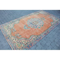 Bungalow Rose Handwoven Turkish Vintage Rug in Vibrant Orange with Medallion Design for Living Room Decor
