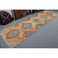 Bungalow Rose Handwoven Turkish Rug Showcasing Vibrant Oranges and Greens in a Unique Geometric Pattern