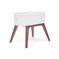 Delta Children Aero Bassinet Modern Portable Baby Crib with Solid Wood Legs, Mattress Pad and Fitted Sheet - White
