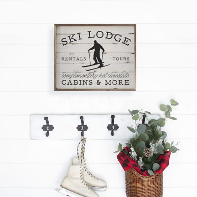 The Holiday Aisle® Ski Lodge Skier Black